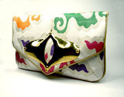 Emi and Eve Malia silver clutch